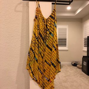Nieves Lavi yellow dress with diagonal stripes